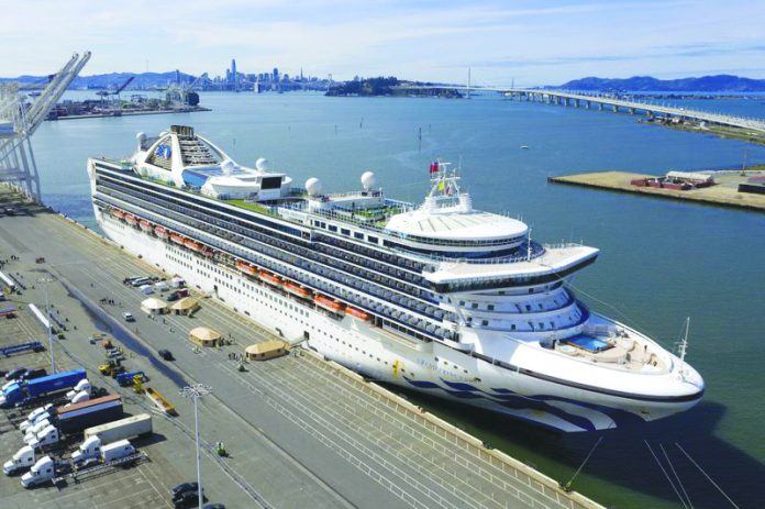 Tents stand on a wharf near the Grand Princess at the Port of Oakland in Oakland, Calif., Monday, March 9, 2020. APTents stand on a wharf near the Grand Princess at the Port of Oakland in Oakland, Calif., Monday, March 9, 2020. AP