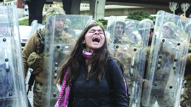 Anti-government protesters have been out on the streets for month amid Lebanon's financial crisis. GETTY IMAGES