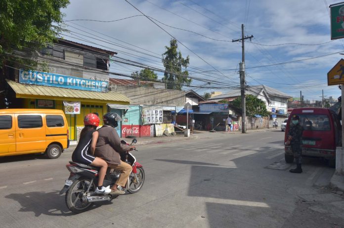 Under the enhanced community quarantine currently being enforced, motorcycles are allowed to transport only one person – its driver. IAN PAUL CORDERO/PN