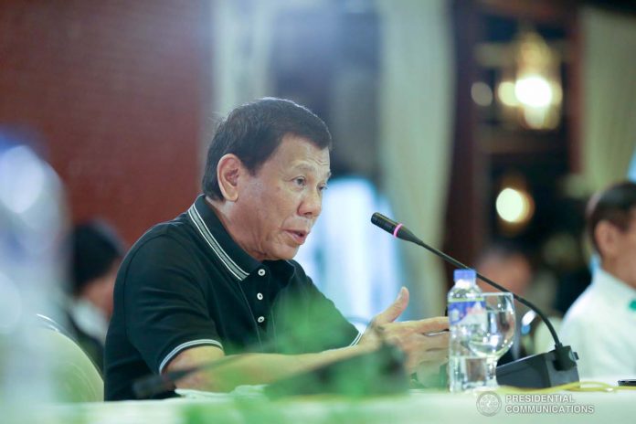 President Rodrigo Roa Duterte presides over a meeting with the Inter-Agency Task Force for the Management of Emerging Infectious Diseases at the Malacañan Palace on March 16, 2020. PCOO