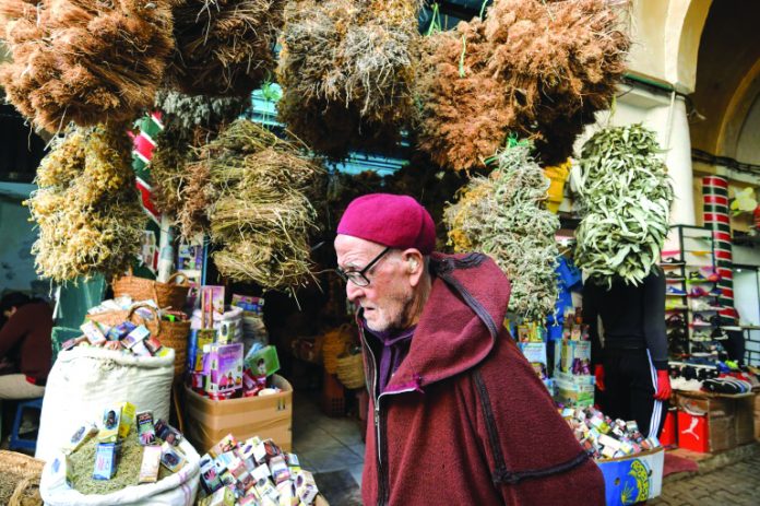 Tunisians flock to the Souk el-Blat in Tunis and its herbalist stalls, where flasks, powders and dried herbs are stacked high. AFP