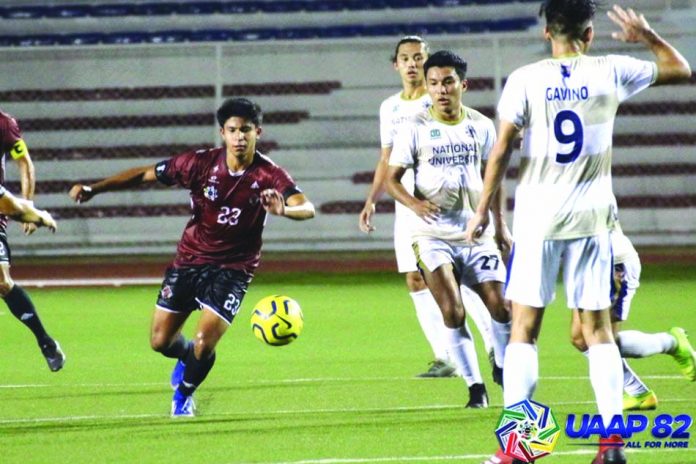 University of the Philippines Fighting Maroons’ Anton Guariña (No.23) tries to evade defenders of the National University Bulldogs during the two teams’ showdown in the University Athletic Association of the Philippines Season 82 Men’s Football.University of the Philippines Fighting Maroons’ Anton Guariña (No.23) tries to evade defenders of the National University Bulldogs during the two teams’ showdown in the University Athletic Association of the Philippines Season 82 Men’s Football.