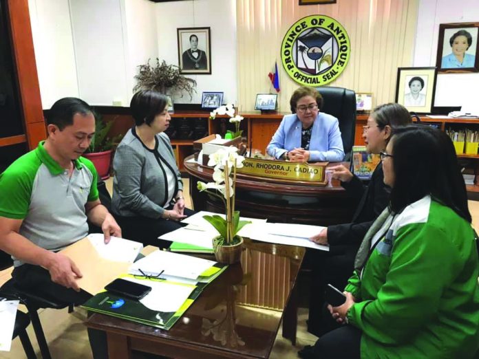 Philippine Health Insurance Corporation (PHIC) regional director Valerie Anne Hollero (2nd from left) makes a courtesy call to Antique Governor Rhodora Cadiao on March 3. Hollero said that no patient under investigation in Western Visayas has yet to claim the new health insurance package provided by the PHIC. PHILHEALTH REGION VI