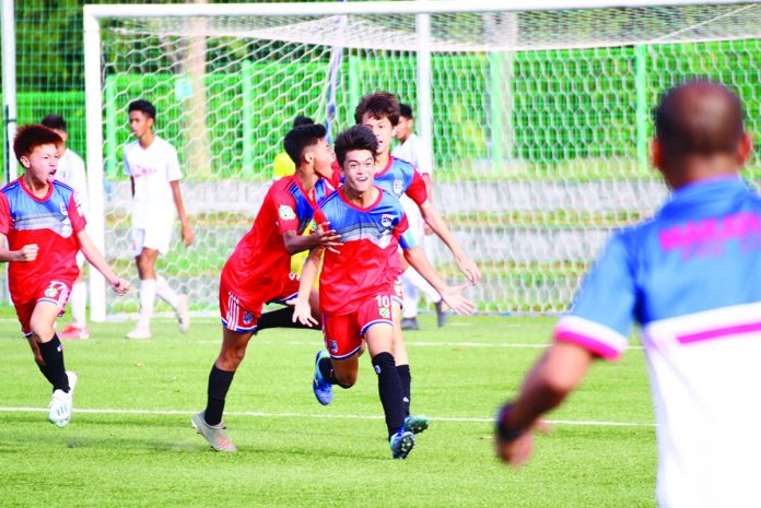 National Capital Region Football Association’s Dominic Tom celebrates after nailing the go-ahead goal in their finals match against Negros Occidental Football Association in Cavite on Feb. 28. PFF