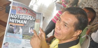 DANNY FAJARDO holds an October 16, 2012 issue of Panay News