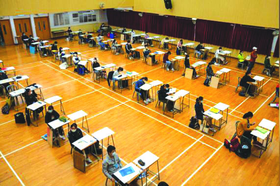 Students attend to take the Diploma of Secondary Education exams following the coronavirus disease 2019 outbreak in Hong Kong China on April 24. REUTERS