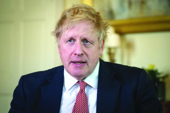Prime Minister Boris Johnson (picture after he was discharged from hospital on April 12) is expected to return to work Monday after recovering from the coronavirus. 10 DOWNING STREET/AFP