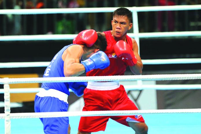 "Eumir Marcial (red) is a national treasure in the making. Please allow him to take the path towards being one with no distractions which threatens to occupy his mind," said Amateur Boxing Association of the Philippines president Ricardo Vargas. The Tokyo-bound Marcial has been receiving staggering offers from certain individuals and entities. ABS-CBN NEWS