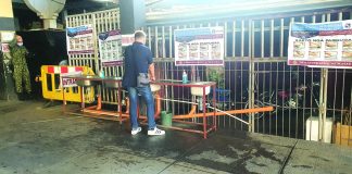 This man cleans his hands at the handwashing station of the Kalibo Public Market. Kalibo vice mayor urged her residents to brace for new normal, saying the fight against coronavirus disease 2019 might still be far from over. JUN AGUIRRE