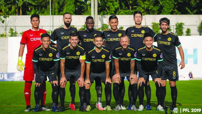 Ceres-Negros FC players pose for a photo before a Philippines Football League match in 2019. The team will keep its 2020 Asian Football Confederation (AFC) Cup slot despite the impending change of ownership and management. CERES-NEGROS FOOTBALL CLUB