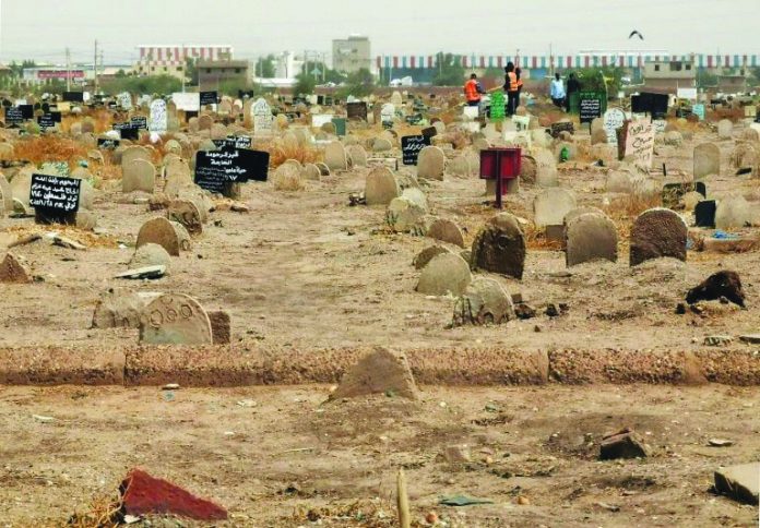 Members of a forensic team at a first mass grave found south of Khartoum, Sudan.