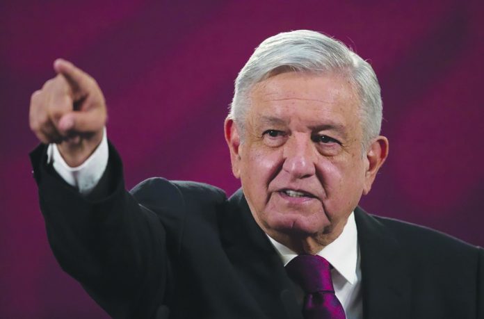 Mexico's President Andres Manuel Lopez Obrador gives his daily, morning news conference at the presidential palace, Palacio Nacional, in Mexico City, Monday, July 13, 2020. AP PHOTO/MARCO UGARTE