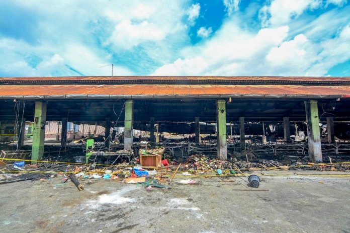 GUTTED BY FIRE. This is what remains of the public market of Leon, Iloilo that was struck by fire late afternoon on July 18, 2020. An estimated 100 stalls were reduced to ashes. The Bureau of Fire Protection has launched an investigation. It is not discounting the possibility that electrical short circuit may have caused the destructive blaze. IAN PAUL CORDERO/PN