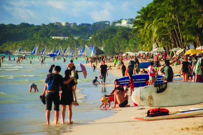 Tourists flood Boracay Island in Malay, Aklan before it was closed earlier this year due to coronavirus disease 2019. Malacañang is urging Western Visayas tourist to spend time in the world-class island which reopened on June 16. SOUTH CHINA MORNING POST