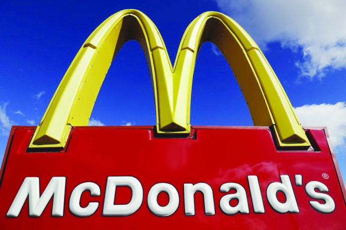 A McDonald’s sign is displayed outside the fast food restaurant in Wheeling, Illinois, United States (US) McDonald’s says it will be requiring customers to wear face coverings when entering its U.S. restaurants as the number of new virus cases continue to surge in many states. The move announced on July 24 will be in effect on Aug. 1.