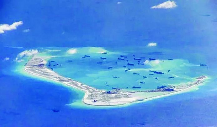 Chinese dredgers at work near the Spratly Islands in the South China Sea. GETTY