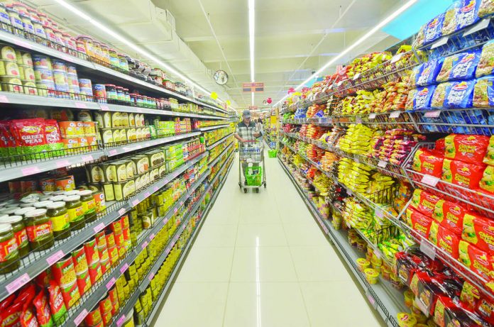 A man shops inside a supermarket in Iloilo City. IAN PAUL CORDERO