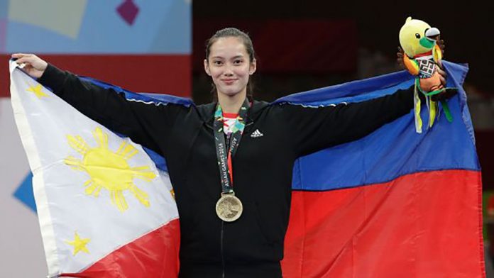 “I always think that I am carrying the flag of the Philippines and the name of the country as a national athlete in wushu,” says Agatha Wong. “It’s always all about hard work and discipline.” AARON FAVILA/AP PHOTO