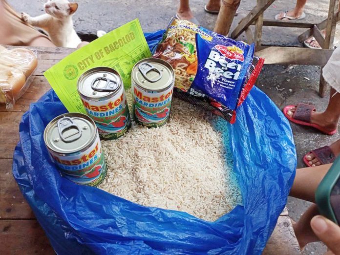 This is the food pack containing rice, canned sardines and noodles that the local government of Bacolod City had been distributing. Netizens took to social media to air their dismay after receiving items labeled “EXP 5 September 2020.” MILROSE VILLEGAS/PN