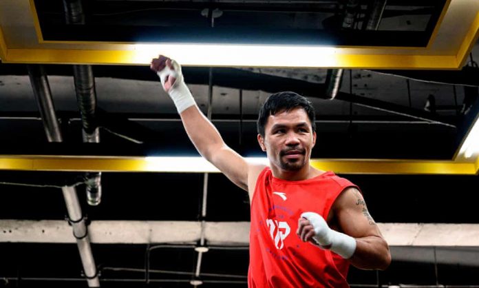 Filipino ring icon Manny Pacquiao is planning to slug it out with Irish mixed martial arts star Conor McGregor next year for the sake of Pinoys hit by the coronavirus pandemic. NOEL CELIS/AFP