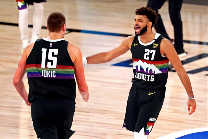 Denver Nuggets’ Jamal Murray and Nikola Jokić rejoice after completing their series win over Los Angeles Clippers. USA TODAY PHOTO