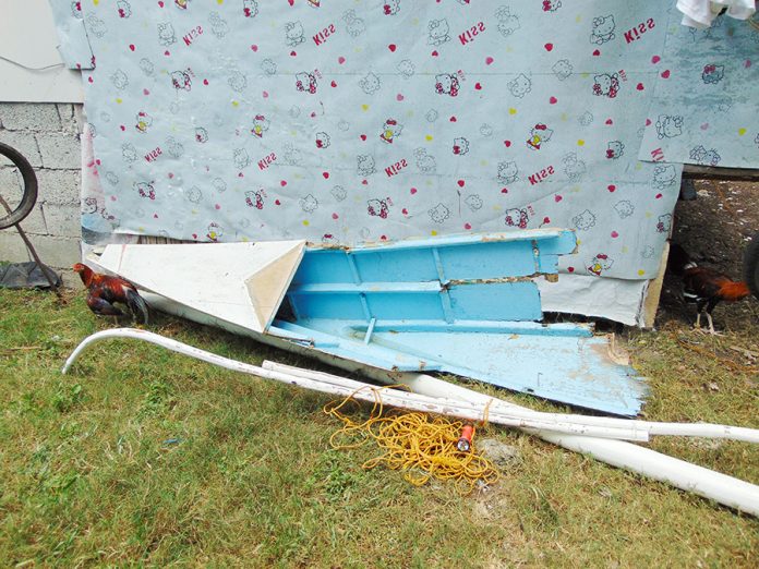 Je-ar Caspe’s fishing boat is mangled beyond recognition. Red scratches can be seen all over the wreckage. Caspe was killed on Sept. 8 after his small boat was allegedly hit by an unidentified roll-on, roll-off ship. DOMINIQUE GABRIEL BAÑAGA/PN