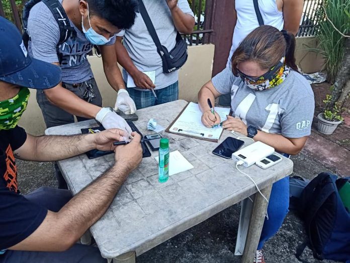 Antidrug officers inspect items seized in a buy-bust operation in Barangay Milibili, Roxas City, Capiz on Sept. 4. PDEA REGION VI