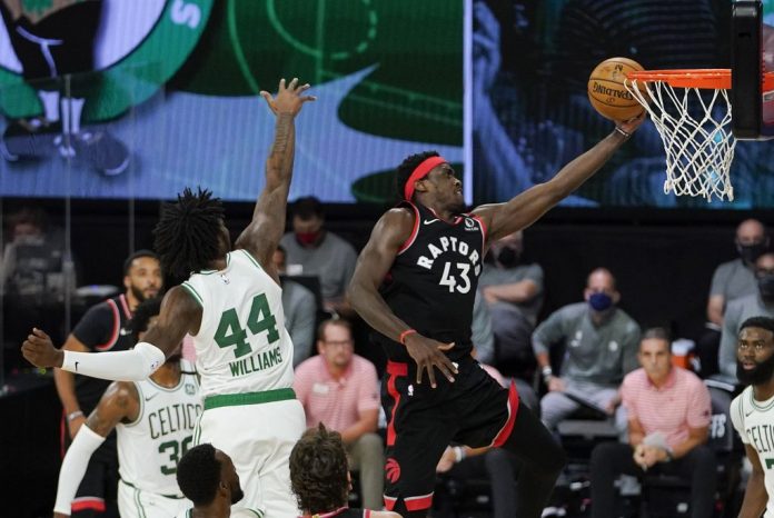 Toronto Raptors star Pascal Siakam goes for a coast-to-coast layup versus Boston Celtics defenders during Game 2 of their Eastern Conference semifinals Saturday night (Sunday in the Philippines). AP