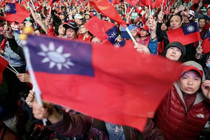 Supporters of Kuomintang party’s presidential candidate Han Kuo-yu wave Taiwanese flags during an election rally in Taipei, Taiwan. ANN WANG, REUTERS/FILE