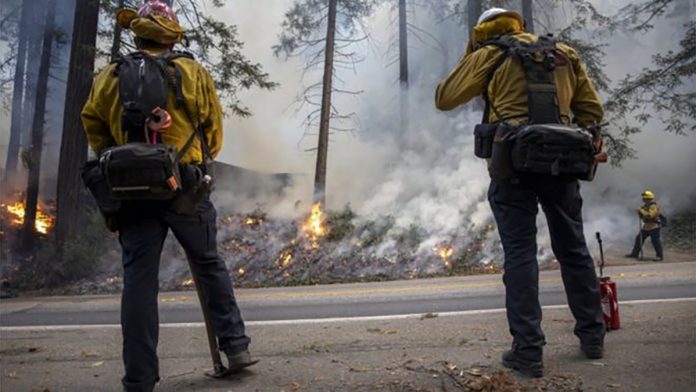 Close to 15,000 firefighters have been deployed to fight more than two dozen wildfires across California. EPA