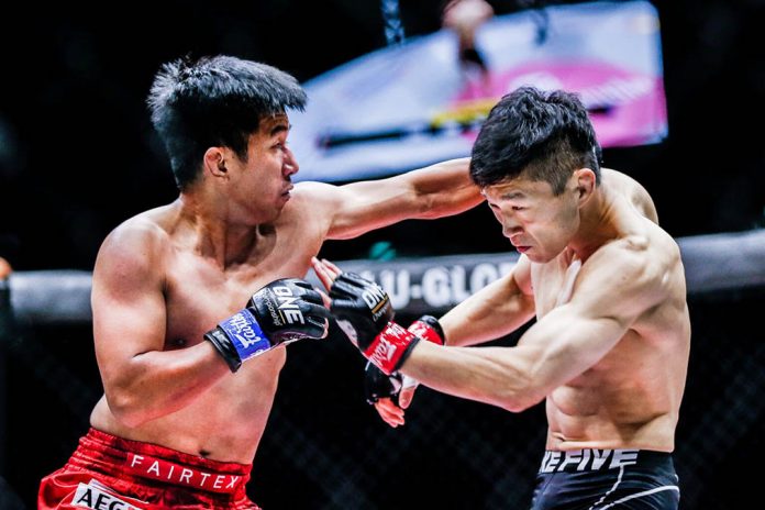 Geje Eustaquio (red) looks to attack South Korean Song Min Jong. ONE PHOTO