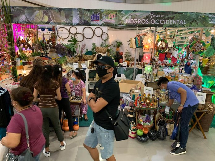 Mall shoppers drop by to check and buy products at the Panublion Heritage Fair at SM City Iloilo Activity Center. DTI WESTERN VISAYAS