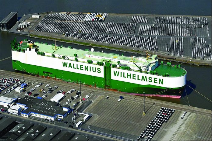 Cars intended for export wait at the port for loading in Bremerhaven, Germany. FABIAN BIMMER/REUTERS