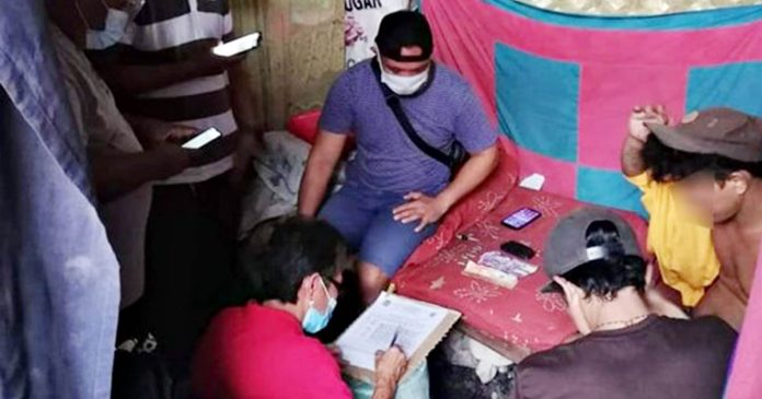 Antidrug operatives conduct an inventory of the suspected shabu seized during an entrapment in Barangay Handumanan, Bacolod City on Dec. 6. PCR BCPO