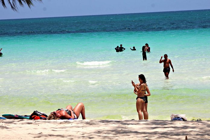 The Department of Tourism is hopeful that the volume of tourists in Boracay Island would continue to improve. PHOTO FROM AKEANFORUM.BLOGSPOT.COM