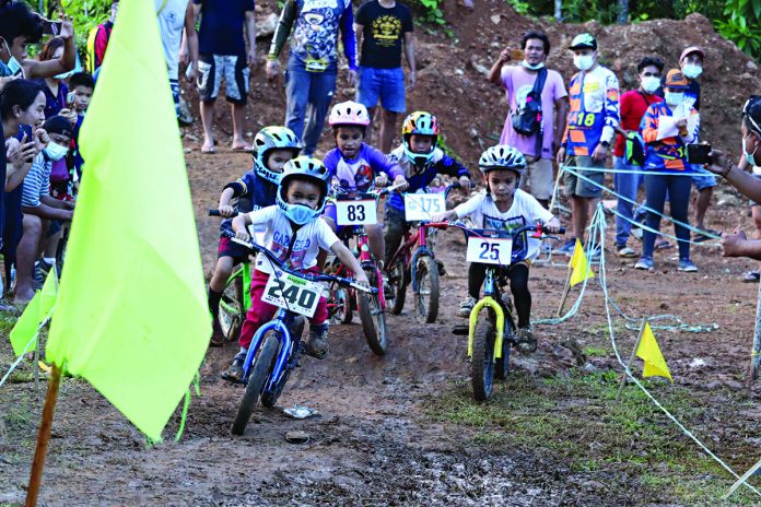 Young cycling enthusiasts participate in the “Bike Fun Race” of Guimaras, the island province’s first sports event after eight months of lockdown.