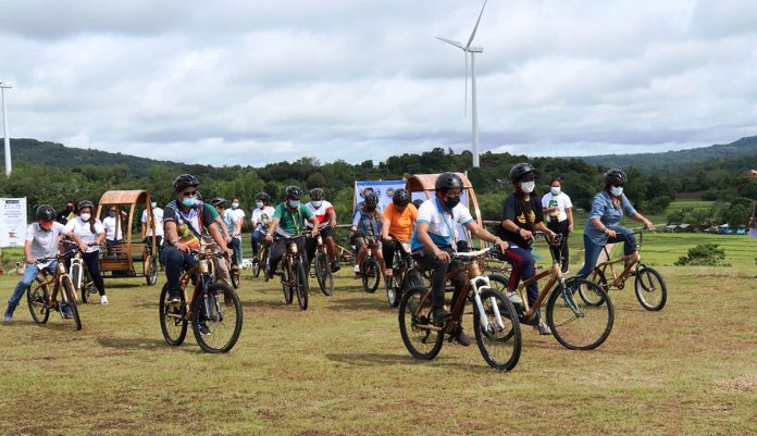 Bicycle enthusiasts try out bikes and pedicabs made of bamboo grown in Guimaras during the launching of the “Green Spark Project” in San Lorenzo, Guimaras.