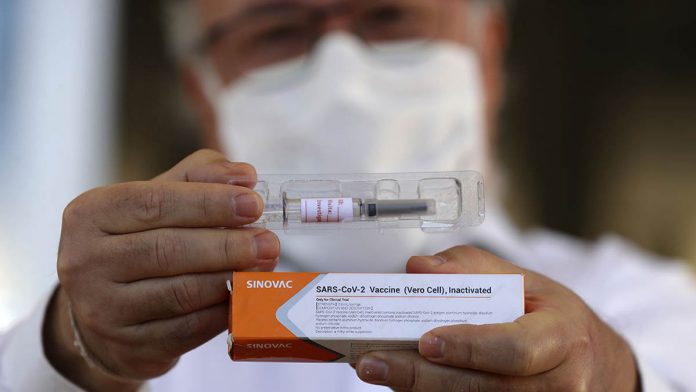 The coronavirus vaccine candidate from China’s Sinovac Biotech remains the Philippines’ first choice despite bribery allegations, according to Palace spokesperson Harry Roque. ERALDO PERES/AP PHOTO