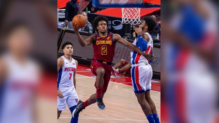 Collin Sexton of the Cleveland Cavaliers drives to the basket against Saddiq Bey of the Detroit Pistons in the first half of their NBA home opener at Little Caesars Arena in Detroit, Michigan. GETTY IMAGES