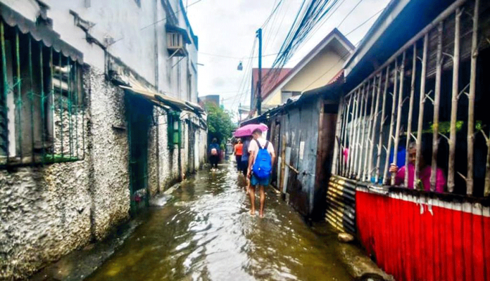 NO CHOICE. If the street is flooded but you need to go home, what do you do? You wade through it — just like these individuals after a heavy downpour. The Iloilo Provincial Health Office says the sharp increase in leptospirosis in 2020 was due to severe flooding brought by successive typhoons.