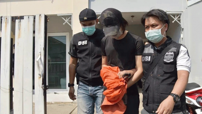 Police arrest Danudetch Saengkaew after more than 500,000 indecent images of children were found on the computer hard drives of his modeling agency. DSI