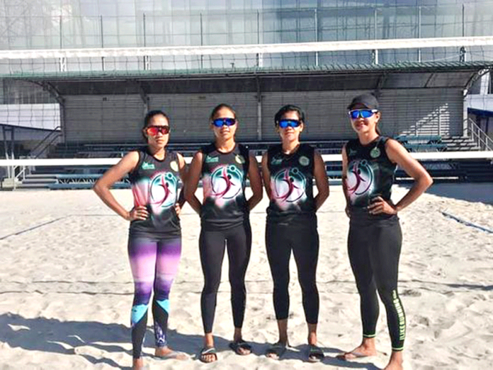 Abanse Negrense beach volleyball players (from left) Alexa Polidario, Erjane Magdato, Jennifer Cosas, and Gelimae Villanueva pose before they train ahead of the 2021 Philippine Superliga Beach Volleyball competition in Subic, Zambales. ABANSE NEGRENSE