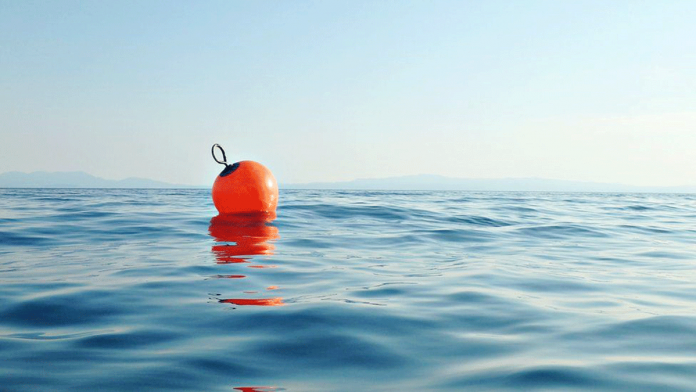 Lithuanian chief engineer, Vidam Perevertilov spends more than 14 hours clinging to an old fishing buoy before being rescued. GETTY IMAGES