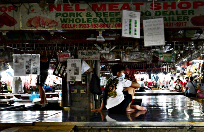 Pork and chicken stalls in Quezon City market are empty on the first day of the implementation of the price ceiling ordered by the government. Meat vendors went on pork holiday due to fear of going bankrupt amid the price freeze. ABS-CBN NEWS