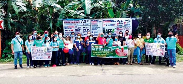 Members of the Iloilo-Bacolod Association of Veterinary Sales Representatives pose for a group photo during the week-long caravan in Panay Island. SMHTORENO/DA-RFO VI/RAFIS