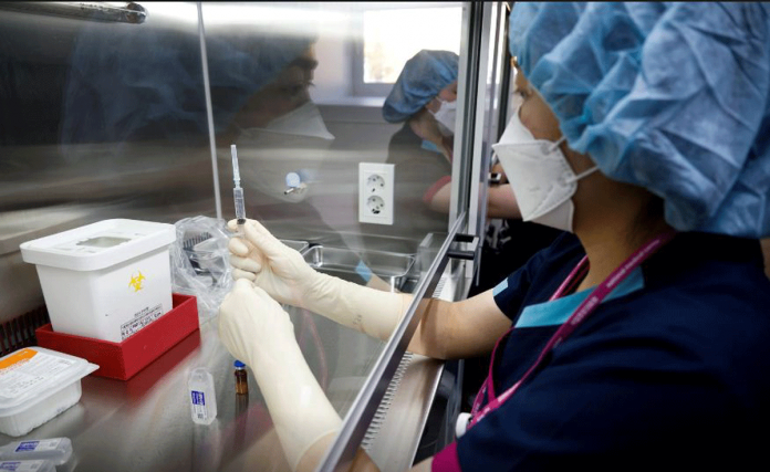 A nurse takes part in the coronavirus disease 2019 (COVID-19) vaccination mock drill at the COVID-19 vaccination center in Seoul, South Korea on Feb. 9, 2021. REUTERS/KIM HONG-JI/POOL/FILE PHOTO