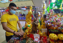 Feng Shui stall vendor Melvin Aranda says people patronize good luck items believing they will bring prosperity and fortune. GLENDA TAYONA/PN