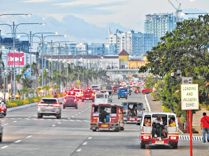 The Sen. Benigno Aquino Jr. Avenue (Diversion Road) in Iloilo City’s Mandurriao district is a bustling 14-kilometer stretch of crisscrossing vehicles. The Land Transportation Office is pushing for a private motor vehicle inspection center system to assess motor vehicles’ roadworthiness. PHOTO COURTESY OF LEW DIS