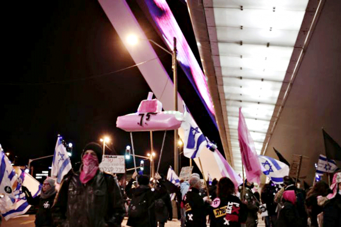 Protesters are on their way to Israeli Prime Minister Benjamin Netanyahu's official residence in Jerusalem. AP PHOTO/MAYA ALLERUZZO