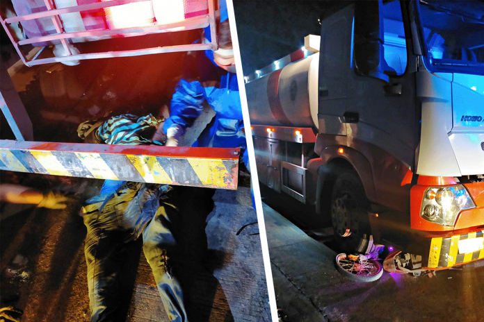 Motorcycle driver Joseph Ordeneza was pinned under a fire truck after a road accident in Barangay Singcang-Airport, Bacolod City on Feb. 17. POLICE STATION 8/BCPO